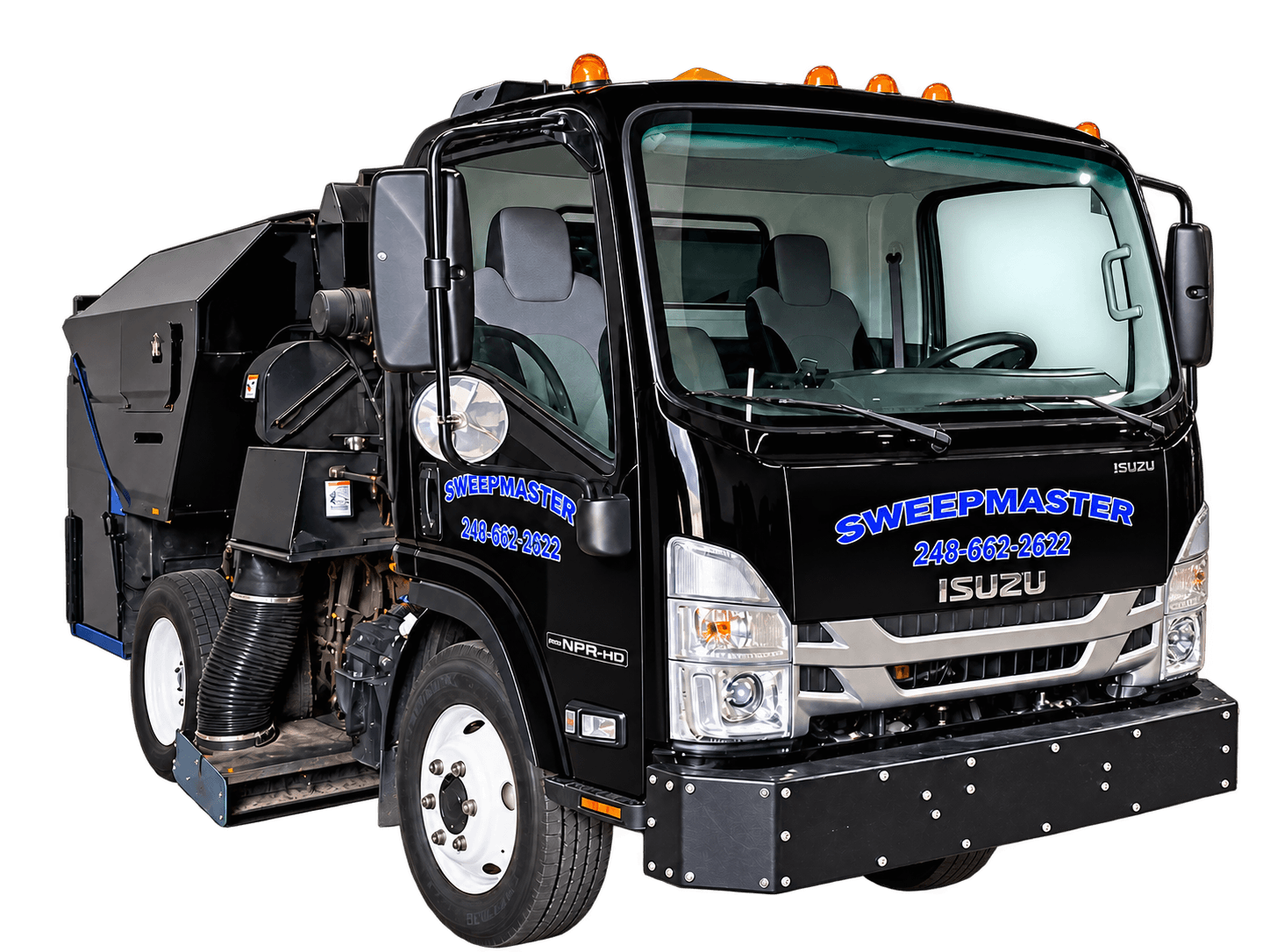 Black Sweepmaster Isuzu sweeper truck, ready for an overnight route