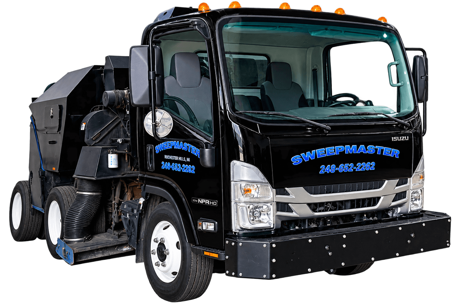 Black Sweepmaster Isuzu sweeper truck, ready for an overnight route